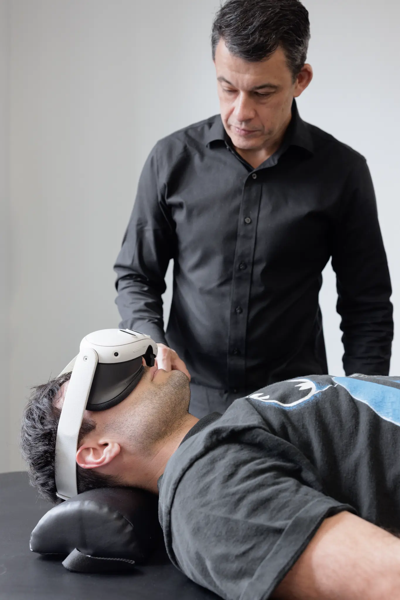 Patient wearing a VR headset during an advanced neuroplasticity therapy session