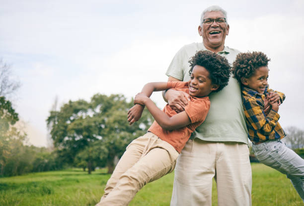 Grandfather playing with kids